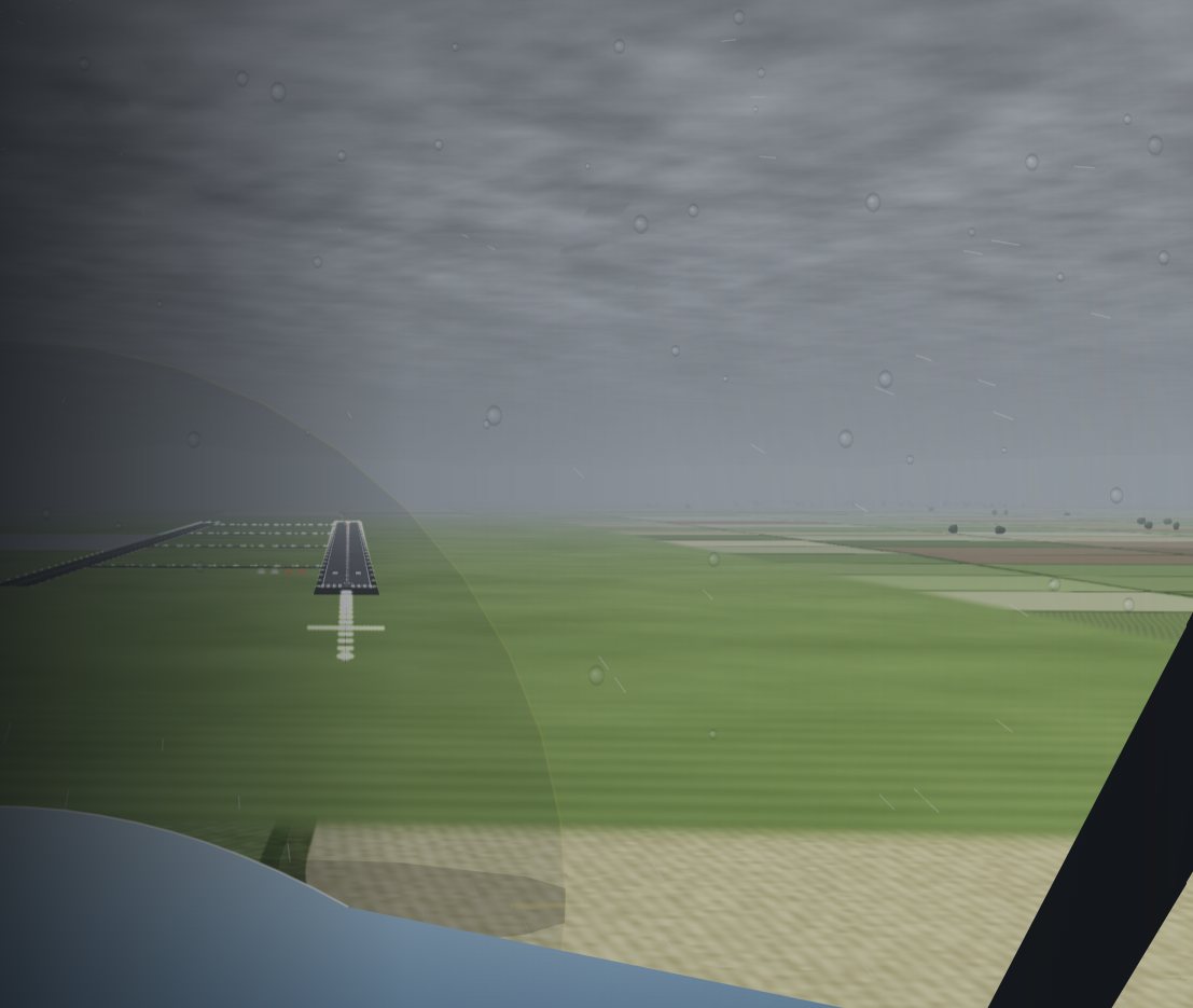 Daytime approach in rain over farmland